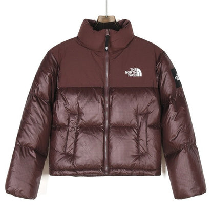 The North Face Brown Puffer Jacket for Season-Long Comfort