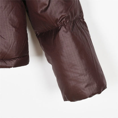 The North Face Brown Puffer Jacket for Season-Long Comfort